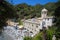 San Fruttuoso di Camogli, Ligurian coast, Genoa province, with its ancient Abbaey, the beach and tourists, Italy