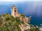 San Gemiliano fortress tower on the rocky coast on the blue sea. Sardinia, Italy. City of Arbatax