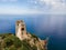 San Gemiliano fortress tower on the rocky coast on the blue sea. Sardinia, Italy. City of Arbatax