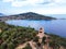 San Gemiliano fortress tower on the rocky coast on the blue sea. Sardinia, Italy. City of Arbatax