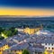 San Gimignano night aerial view, church and medieval town landmark. Tuscany, Italy