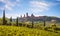 San Gimignano panoramic medieval town towers skyline and vineyards. Tuscany, Italy