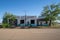 San Jon, New Mexico - May 6, 2021: Old abandoned former Route 66 service and auto repair gas station, in complete disrepair