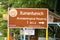 San Jose Succotz, Cayo, Belize - June 18, 2022: The official Xunantunich Archeological Reserve sign guiding visitors to