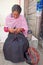 SAN JUAN CHAMULA, MEXICO - Apr 20, 2019: Woman handcrafting colourful bracelets