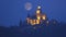 San Luca Church with red moon