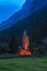 San Lurench church in Sils im Engadin village with illumination during blue hour.