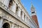 San Marco bell tower and National Marciana library facade in Venice, Italy