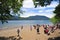 San Martin de los Andes, lake and transparent waters, white sand beaches with trees and blue sky, tourist on the beach, NeuquÃ©n