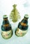 San Miguel beer bottles and christmas tree in snow