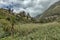 San Pedro Rocks - volcanic twin mountains, natural landmark of La Hermigua in La Gomera. Sunny day - typical rural area, banana