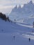 San Pellegrino valley - rocky Dolomites mountains and a skier in motion