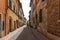 San Quirico d`Orcia, Italy - April 24, 2018: Street view of San Quirico d`Orcia. A small typical town in Italy