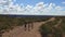 San Rafael, Argentina, November 23, 2016: Group of young people exercising in wonderful view in Valle Grande