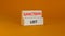 Sanction list symbol. Wooden blocks with concept words Sanction list on beautiful orange background. Business political sanction