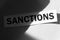 Sanctions word written on paper . the concept on the topic of sanctions in Russia