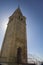 Sanctuary Madonna dell`Angelo bell tower in Caorle during sunset with the sea and blue sky in the background