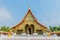 Sanctuary, Wat Wang Kham Temple, Khao Wong District, Kalasin Province, with the blue sky cloud.The public property in Thailand