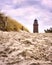 Sand away to the lighthouse, Darsser place on the Baltic Sea. Germany