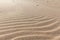 Sand background.Sand ripple.Sand texture.Beautiful nature background.Summer landscape. Golden sands