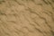 Sand on the beach abstract background, rippled pattern