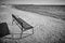 Sand beach with bench in Finland. Yyteri area. Black white