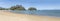 Sand beach and boats at buoy mooring in bay, Kaiteriteri, Abel Tasman park, New Zealand