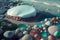 Sand Beach Covered with Colorful Luminous Transparent Pebbles