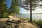 Sand beach at lake Vargforsdammen, a reservoir in the stream Skelleftealven in Northern Sweden