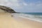 Sand beach with lava rocks in Fuerteventura