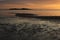 Sand beach at the shore of Lake Vanern. Sunrise scene