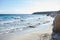 Sand beach, summer sea with blue sky. Sea water with white wave. Cala azzurra beach, Favignana island, Trapani, Sicily, Italy. A