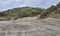 Sand blowing across the beach in Cefn Sidan, and into the marram grass covered coastal dunes.