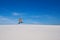 Sand boarding in desert at sunny day