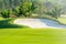 sand bunkers and lake in the golf course northern of Thailand with sky background