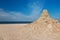 Sand castle on the beach. Ruins