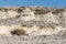 Sand, cliffs and vegetation in Sarakiniko beach