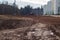 Sand construction site, pit and tractor in sunlight