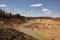 Sand deep quarry under a blue cloudy sky