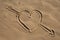 Sand drawn heart and arrow