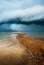 Sand dune and rain storm