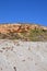 Sand dune and rocky hill