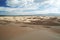 Sand dunes on a blue sky