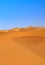 Sand dunes and cloudless sky