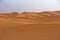 Sand dunes in Erg Chebbi at sunrise, Sahara desert, Morocco