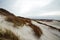 Sand dunes on the island of Amrum in spring on a cloudy day