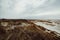 Sand dunes on the island of Amrum in spring on a cloudy day