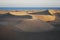 Sand dunes of the Maspalomas desert near the Atlantic Ocean.