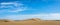 Sand in the Dunes of Maspalomas, a small desert on Gran Canaria, Spain. Sand and sky. Panorama image