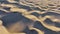 Sand dunes meet the Atlantic Ocean. Top view of Maspalomas sand dunes.